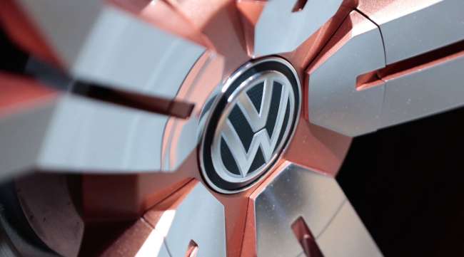 The Volkswagen logo sits on an alloy wheel on an automobile in Geneva, Switzerland.