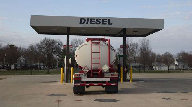 Tanker truck at a fueling station