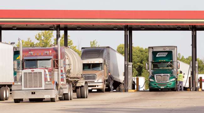 Trucks fueling at a station