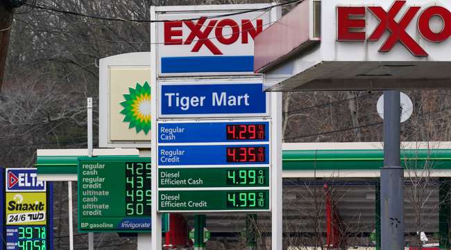Gas prices are displayed at gas stations in Englewood, N.J., March 7.