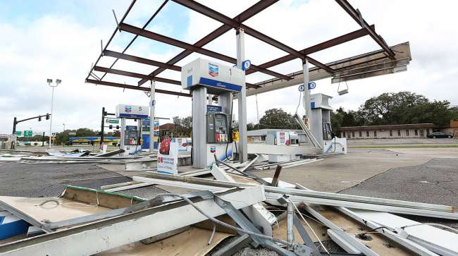 A Chevron gas station is wrecked in Leesburg, Fla. on Monday, Sept. 11, 2017.