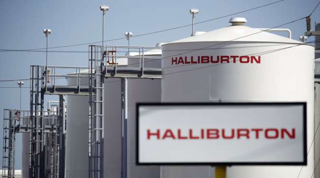 Halliburton signage is displayed alongside storage tanks in Port Fourchon, La., on June 11.