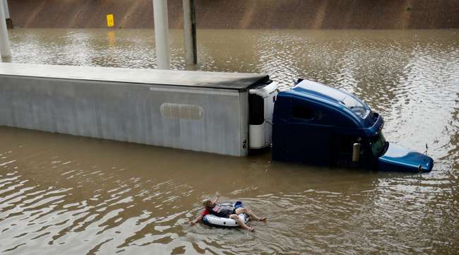 truck immersed in floodwaters