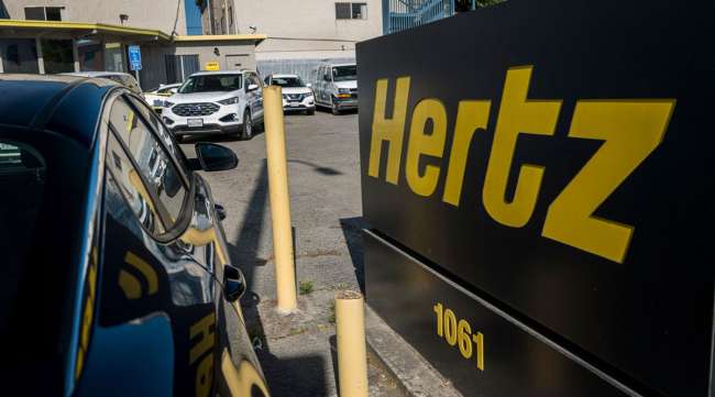 Hertz signage stands at a rental location in Berkeley, Calif., in May 2020. (David Paul Morris/Bloomberg News)