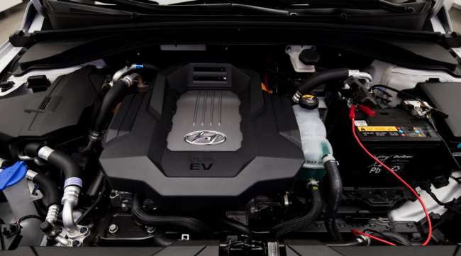 An engine sits inside a Hyundai Ioniq electric vehicle on display in July 2018.