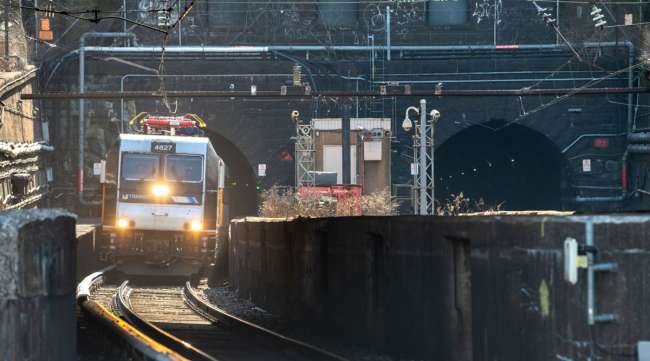 A New Jersey Transit train exits the North River Tunnels, a pair of tunnels that carry Amtrak and NJ Transit trains under the Hudson River.