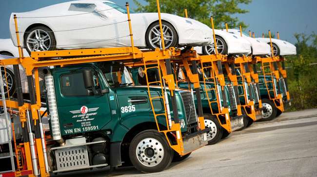 Jack Cooper truck hauling Corvettes