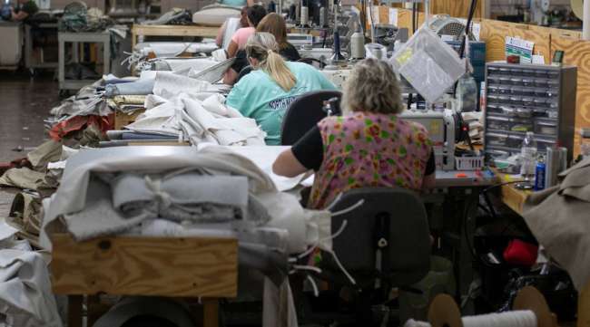 Employees sew fabric at a facility in Hickory, N.C. (Logan Cyrus/Bloomberg News)