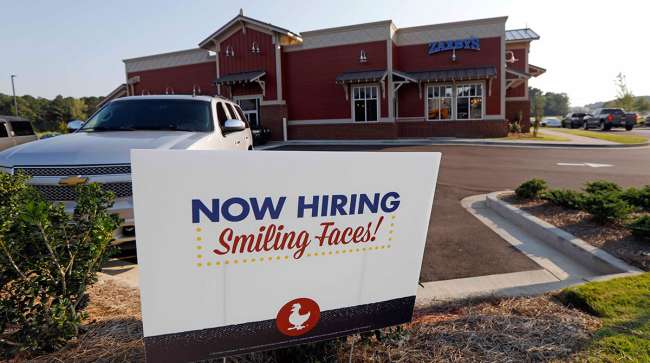 A help wanted sign at a new Zaxby's restaurant in Madison, Miss.