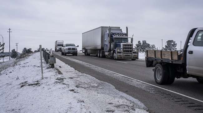 Trucks on Texas road in winter
