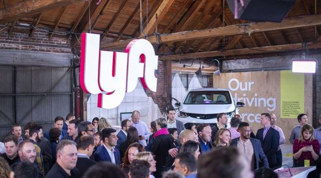 Signage is displayed during the Lyft IPO at the company's service center in Los Angeles in March 2019.