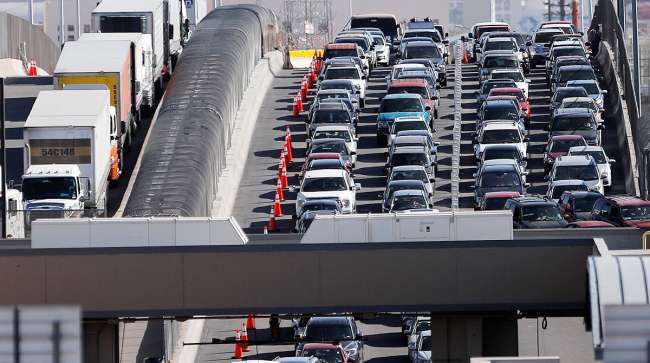 Vehicles enter U.S. from Mexico at El Paso, Texas