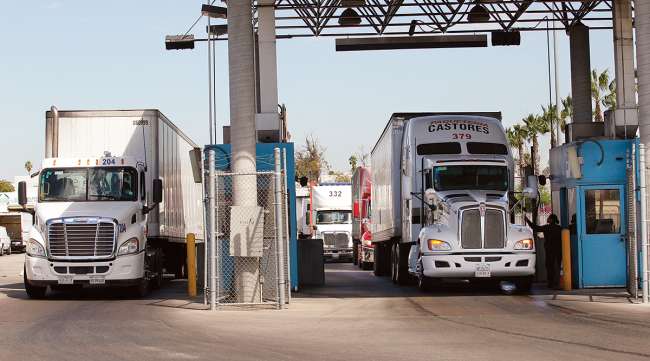 Trucks are inspected at Otay Mesa as they cross from Mexico to the U.S.