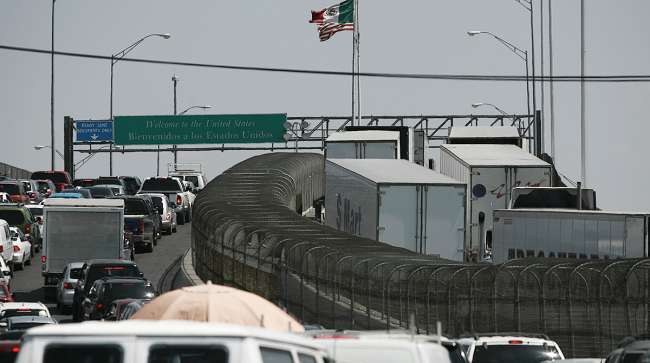 Trucks line up at the Cordova - Las Americas international bridge