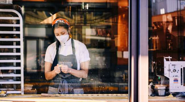 A worker preps food at a restaurant in downtown Memphis, Tenn. (Nina Westervelt/Bloomberg News)