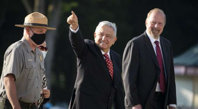 Andres Manuel Lopez Obrador, Mexico's president, waves as he arrives at the Lincoln Memorial in Washington on July 8.