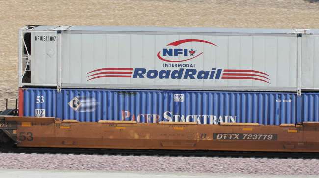 NFI intermodal containers travel by rail