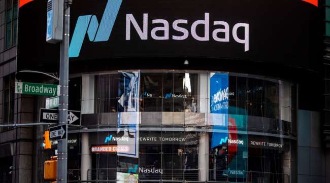 Signage is displayed outside the Nasdaq Market Site in the Times Square area of New York on May 12.