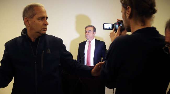 Carlos Ghosn, former CEO of Nissan and Renault SA, prepares to speak to the media in Lebanon on Jan. 8.