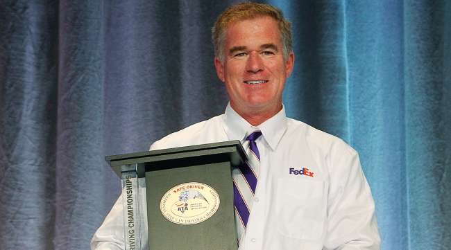 Colorado's Eric Damon of FedEx Express with Step Van trophy