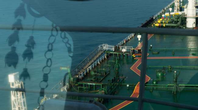 A crude oil tanker sails through the Persian Gulf. (Ali Mohammadi/Bloomberg News)