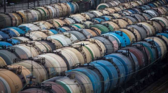 Rail wagons for oil, fuel and liquefied gas cargo stand at a station in Russia on April 27.