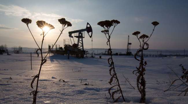 An oil pumping jack operates in Russia.