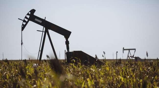 A pump jack operates in Kansas on Sept. 25.