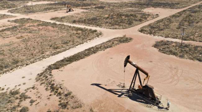 Pumpjacks operate on oil wells in the Permian Basin in Crane, Texas, in 2018.