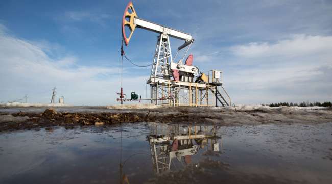 Oil declined as data showing rebounding demand wasn’t enough to offset ballooning inventories.