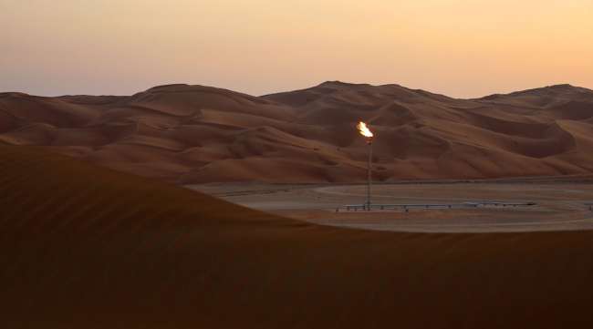 Flames burn off an oil processing facility in Saudi Arabia in October 2018.