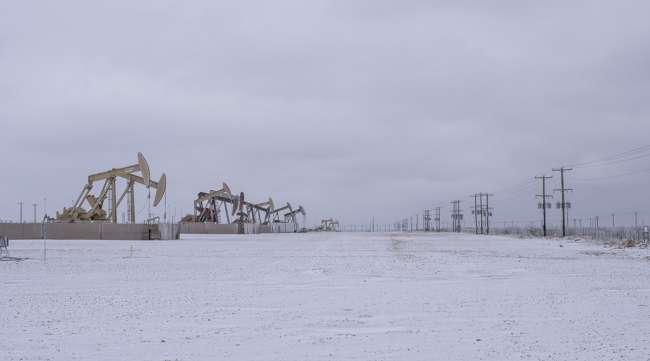 Pump jacks operate in the Permian Basin in Midland, Texas, on Feb. 13. (Matthew Busch/Bloomberg News)