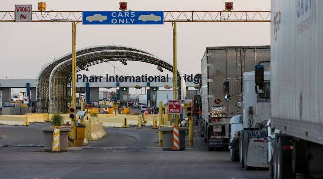 Commercial trucks wait to cross the Pharr-Reynosa International bridge on April 13, 2022.