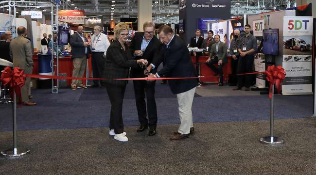 ATA President Chris Spear cuts the ribbon to open the MCE Exhibit Hall