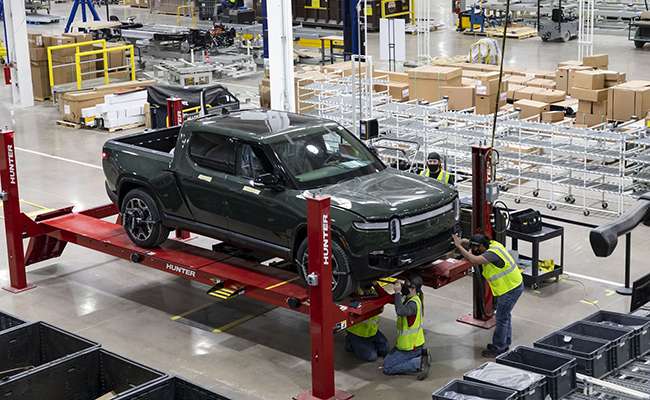An RT1 truck is assembled and tested on the factory floor at the Rivian factory in Normal, Ill.