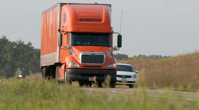 Schneider truck on a highway