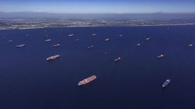 Containerships moored off the ports of Los Angeles and Long Beach, Calif.