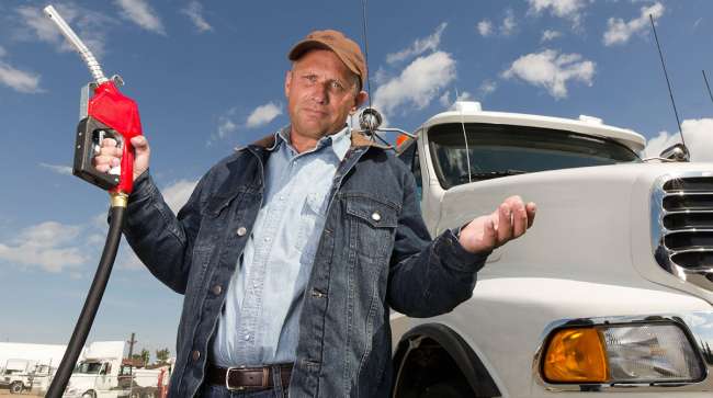 Image of truck driver frustrated by high fuel prices
