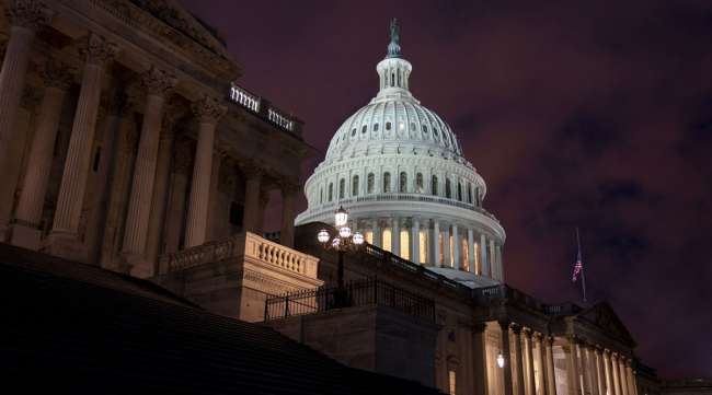 The U.S. Capitol building is seen at dawn on Feb. 9. (Stefani Reynolds/Bloomberg News)