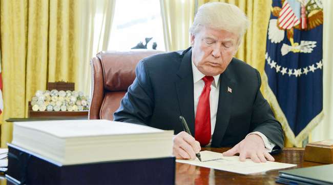 President Trump signs the tax reform bill