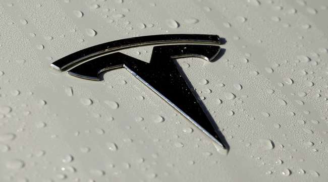 The Tesla logo on a vehicle