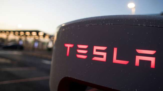 A Tesla charging station is seen in the U.K. on Dec. 15. (Chris Ratcliffe/Bloomberg News)