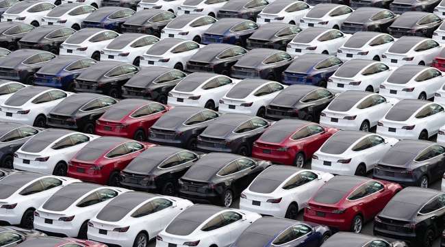 Tesla Inc. vehicles in a parking lot in Yokohama, Japan