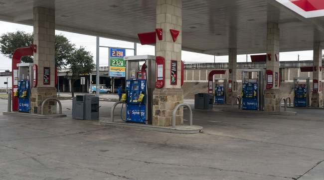 Gas pumps are out of service at an Exxon gas station in Houston Feb. 18. (Go Nakamura/Getty Images via Bloomberg News)