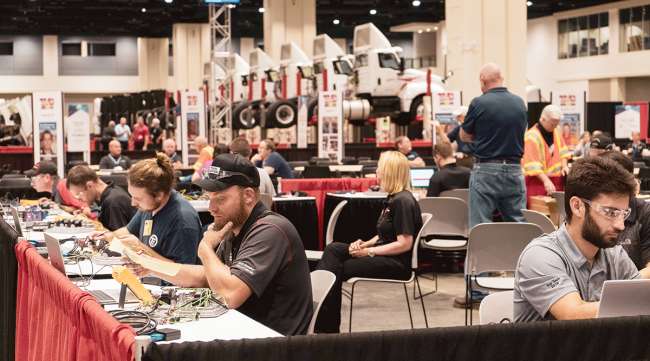 Competitors take the written test at 2019 TMC's SuperTech event