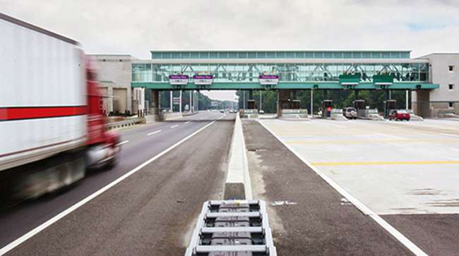 Truck approaches toll booth