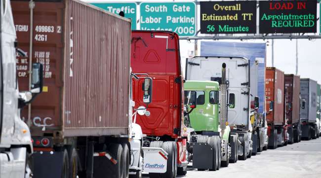 Trucks drive over border