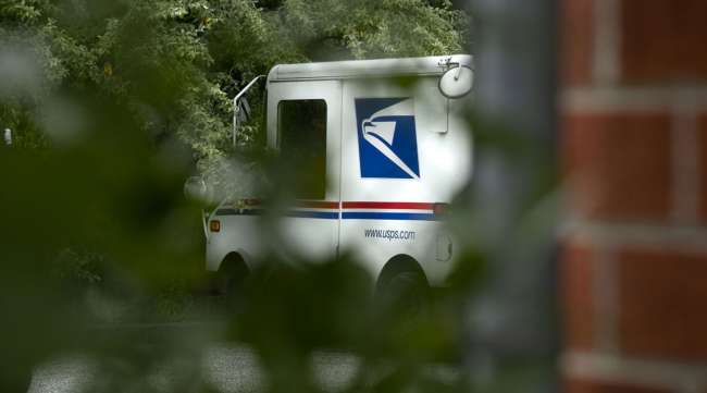 A USPS truck sits at a facility in Elkridge, Md., on Aug. 16.