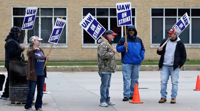GM workers continue to strike.