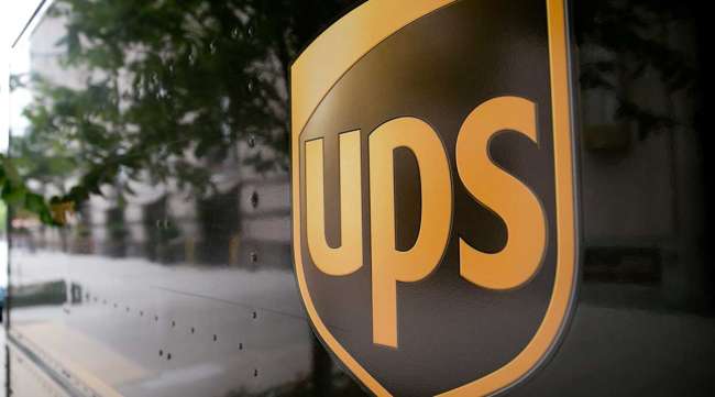 Close-up photo of UPS truck and logo